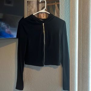 This is a large zip up black sweater from shein it runs a little smaller